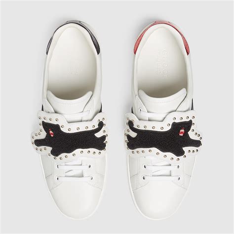 gucci sneakers with patches.